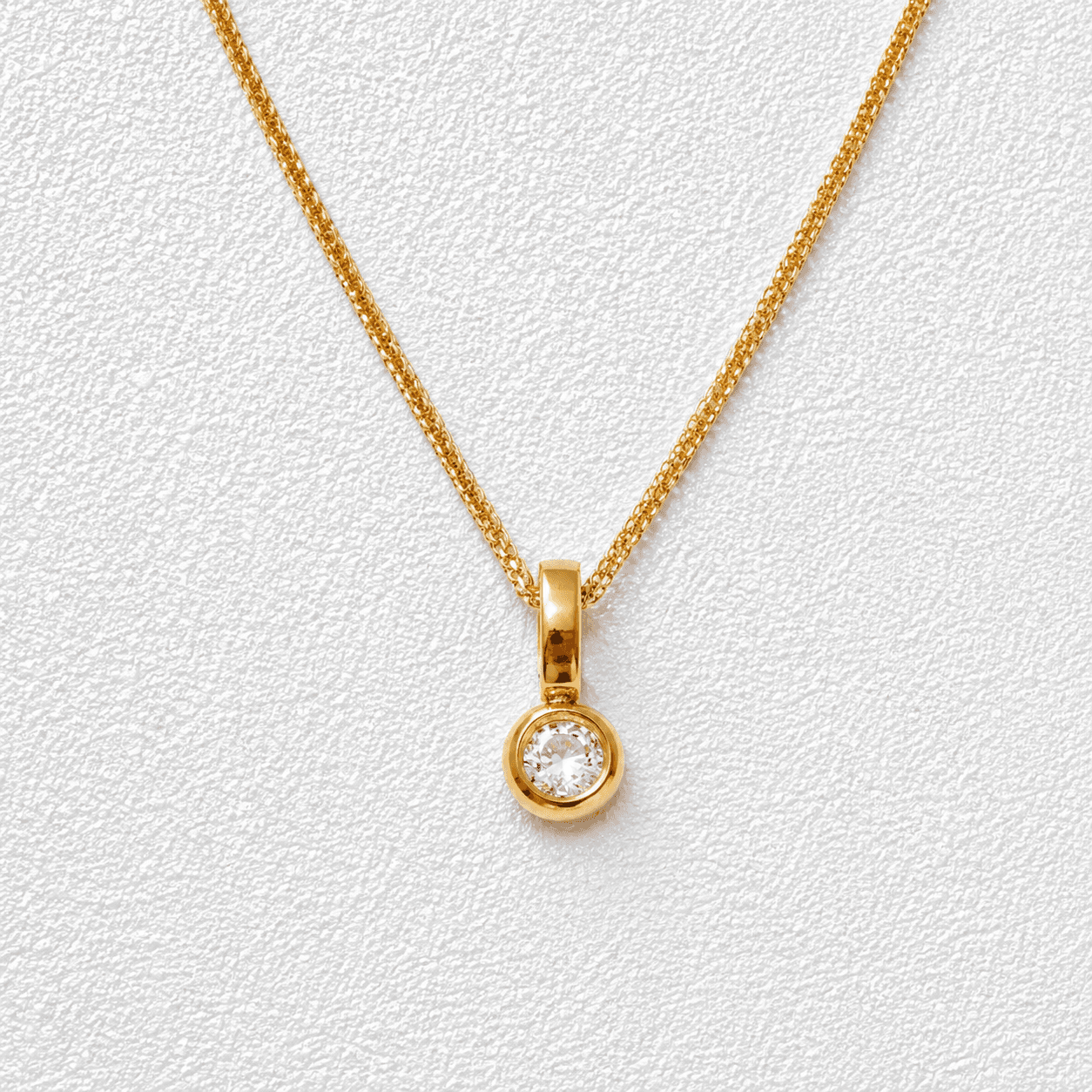 Punto de Luz Collar · Cadena doble · Circonita redonda · Montura bezel